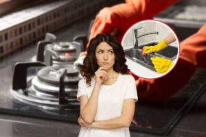 donna che pensa e pulizia lavandino e fornelli