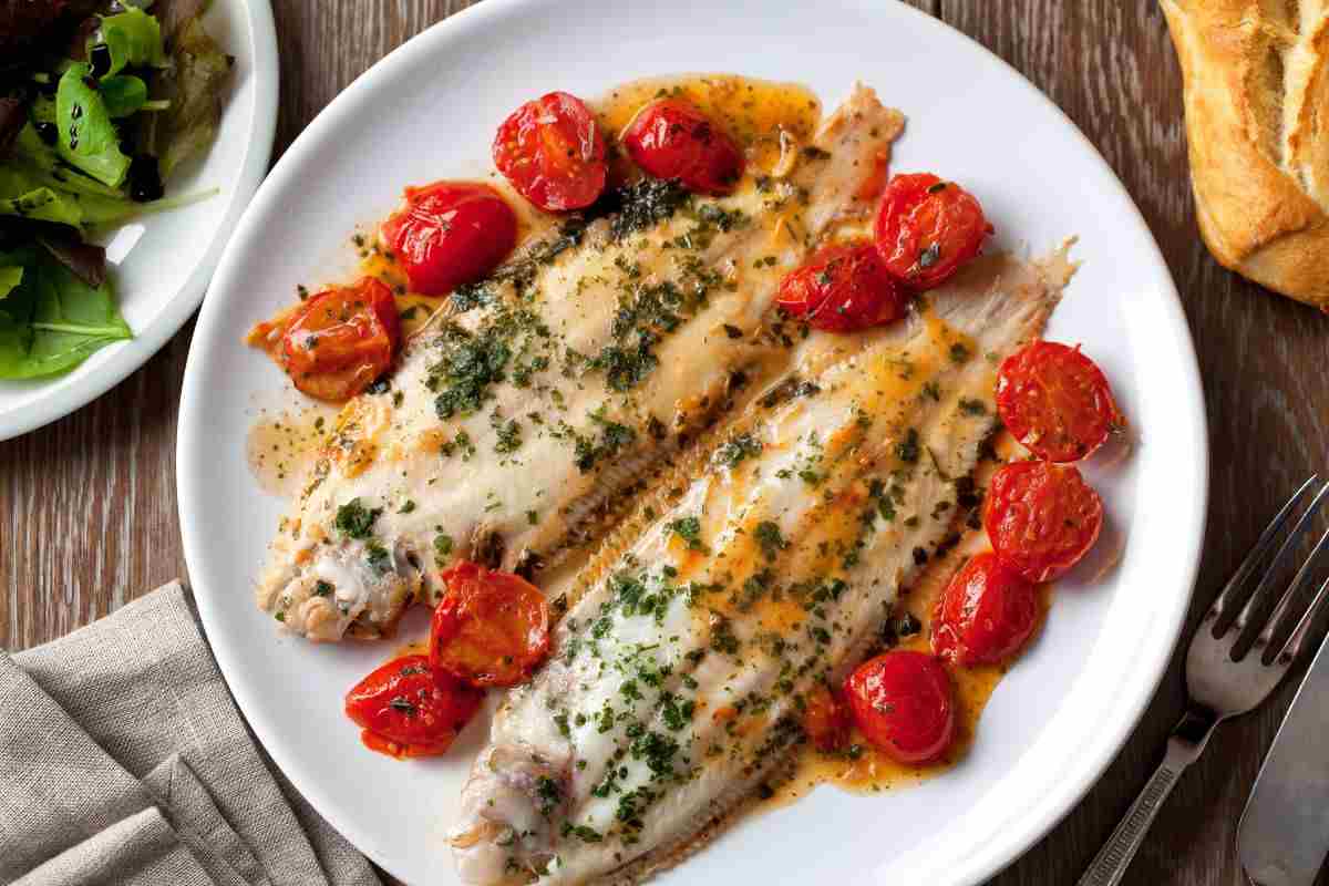 Sogliola cucinata con pomodorini prezzemolo e salsa